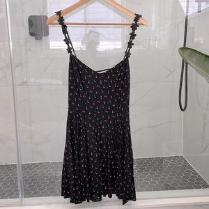 Black sundress with flowers. Brand is KIMCHI BLUE. Size XS.